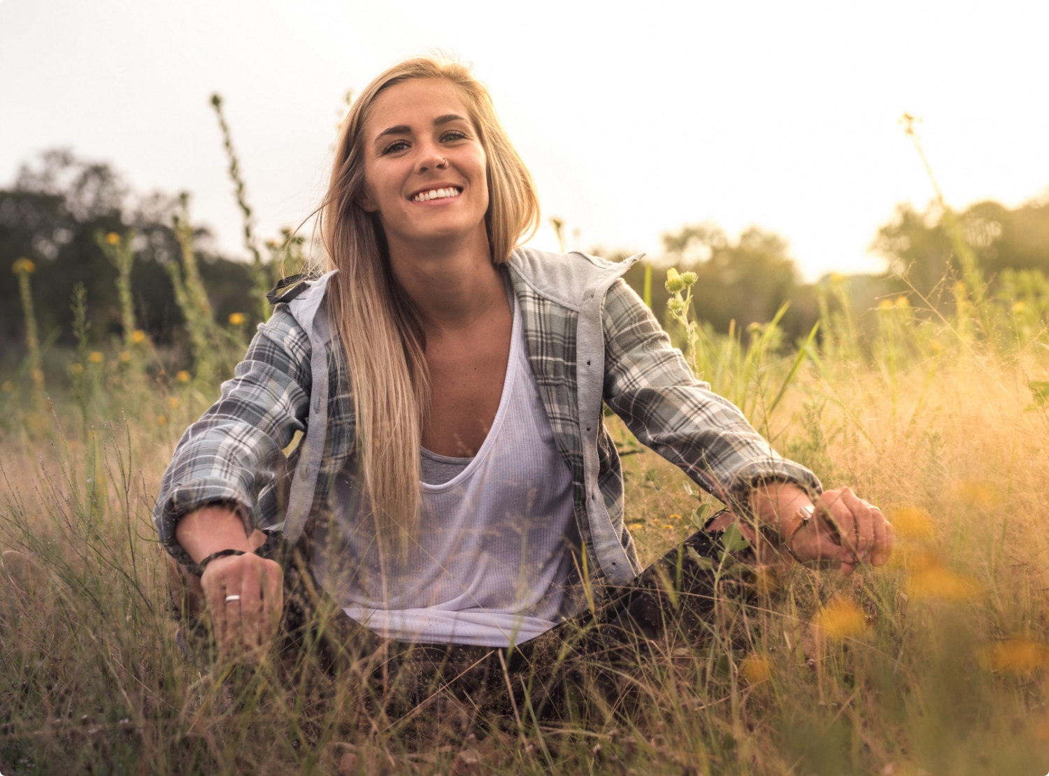 women sitting in nature enjoying being free of their addiction or issue